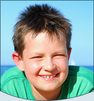 smiling boy on the beach